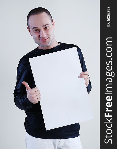 Man with placard at white background