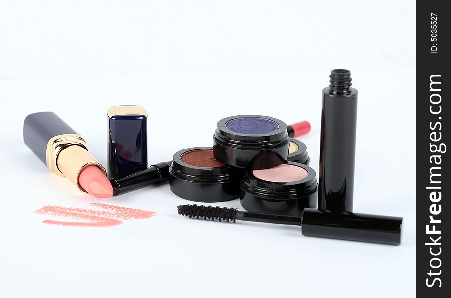 A collection of make-up on a white background. A collection of make-up on a white background.