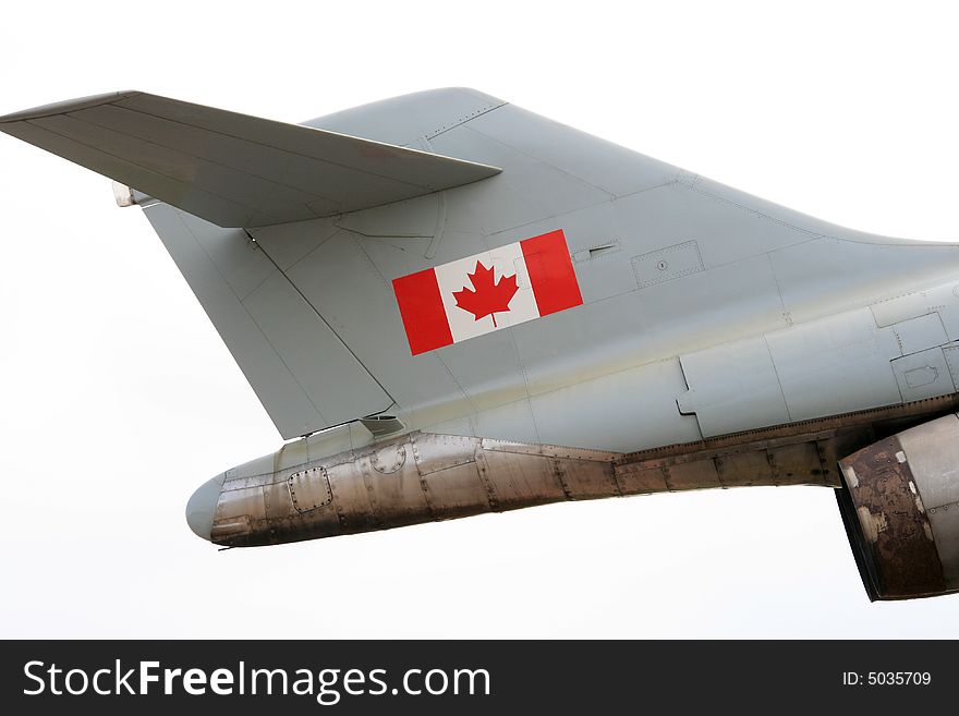 Close up detail of the tail section of an older Canadian military jet