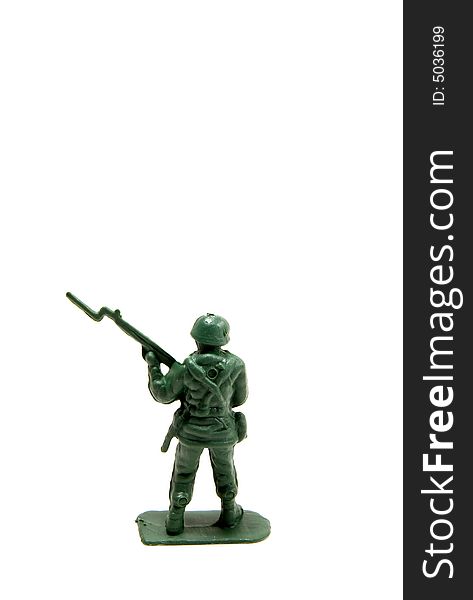 Green army man with rifle and bayonet on a white isolated background.