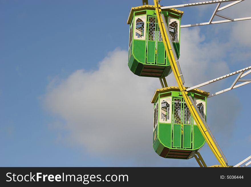 Giant Wheel detail, isolated in blue sky background