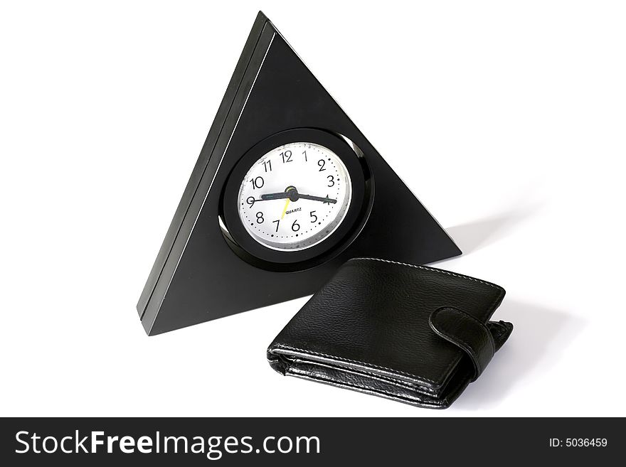The triangular clock and purse on a white background