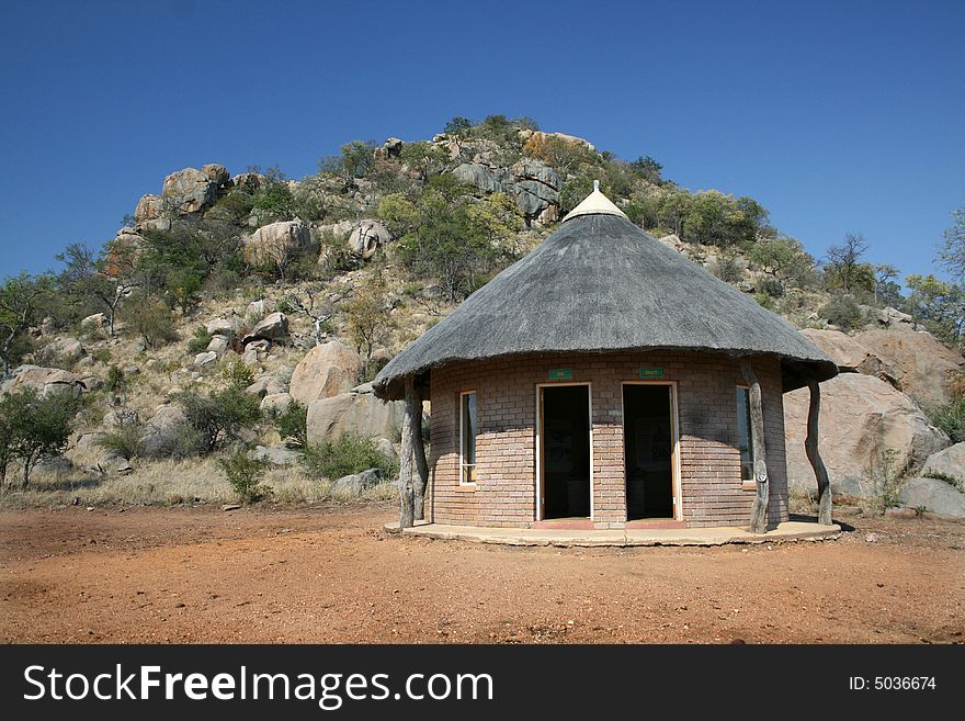 African Hut at the foot of a granite hill in South Africa. African Hut at the foot of a granite hill in South Africa.