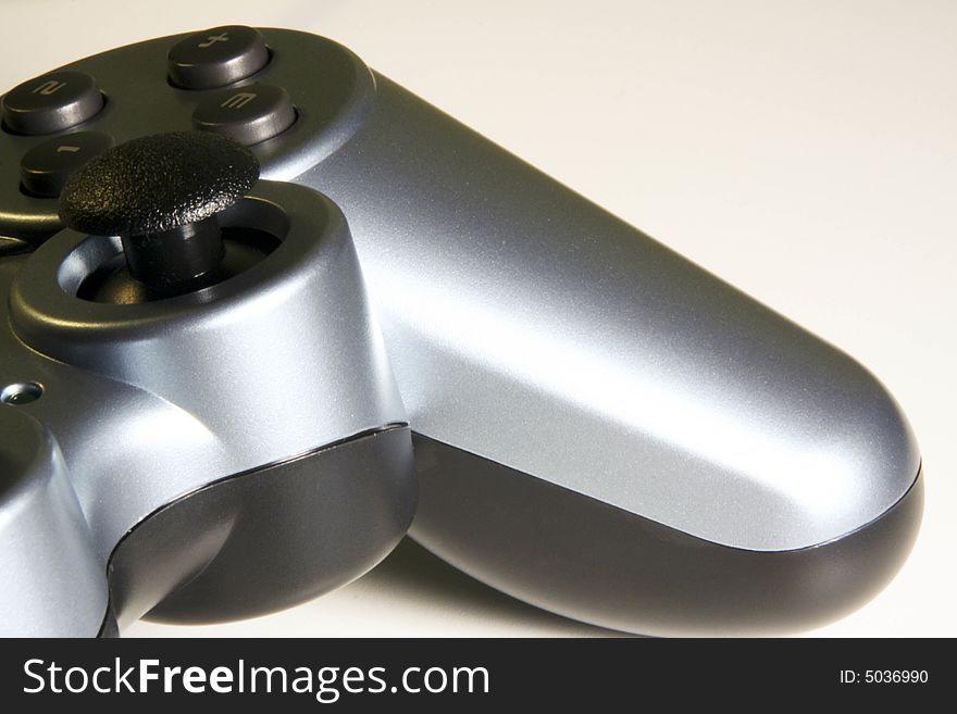 A detail of a game controller. A detail of a game controller