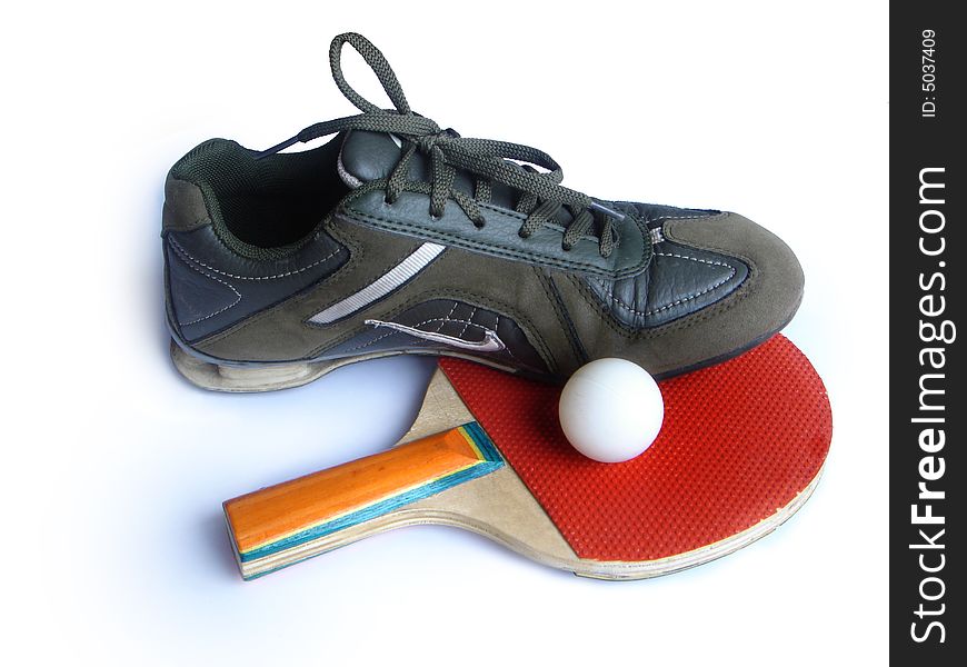 Sneaker with tennis racket and small tennis ball. Sneaker with tennis racket and small tennis ball