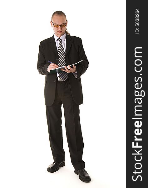 Businessman in yellow glasses writing in notebook isolated on white background. Businessman in yellow glasses writing in notebook isolated on white background