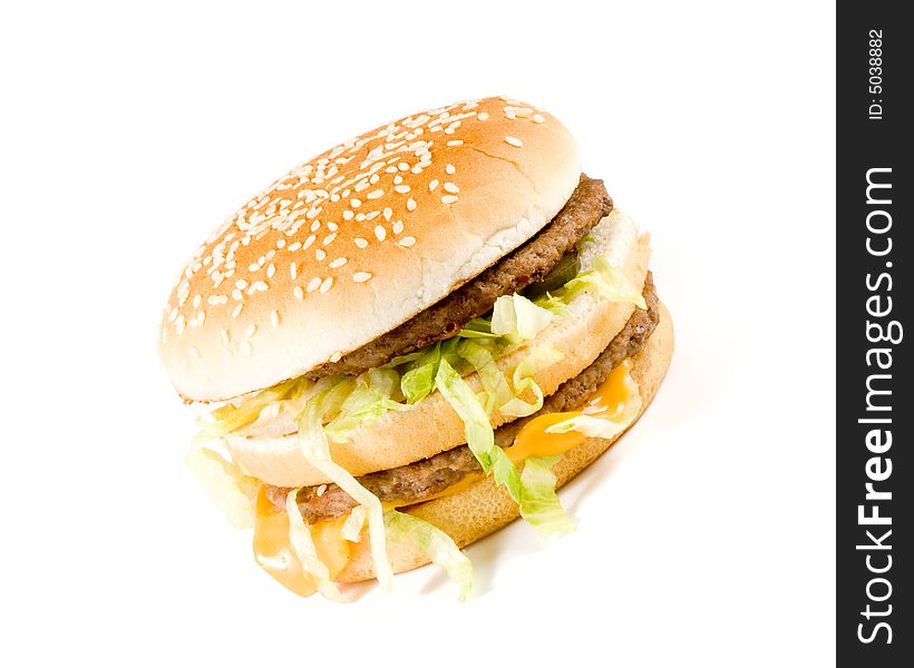 Bread with fried meat, cheese, onion and lettuce isolated on a white background. Bread with fried meat, cheese, onion and lettuce isolated on a white background.