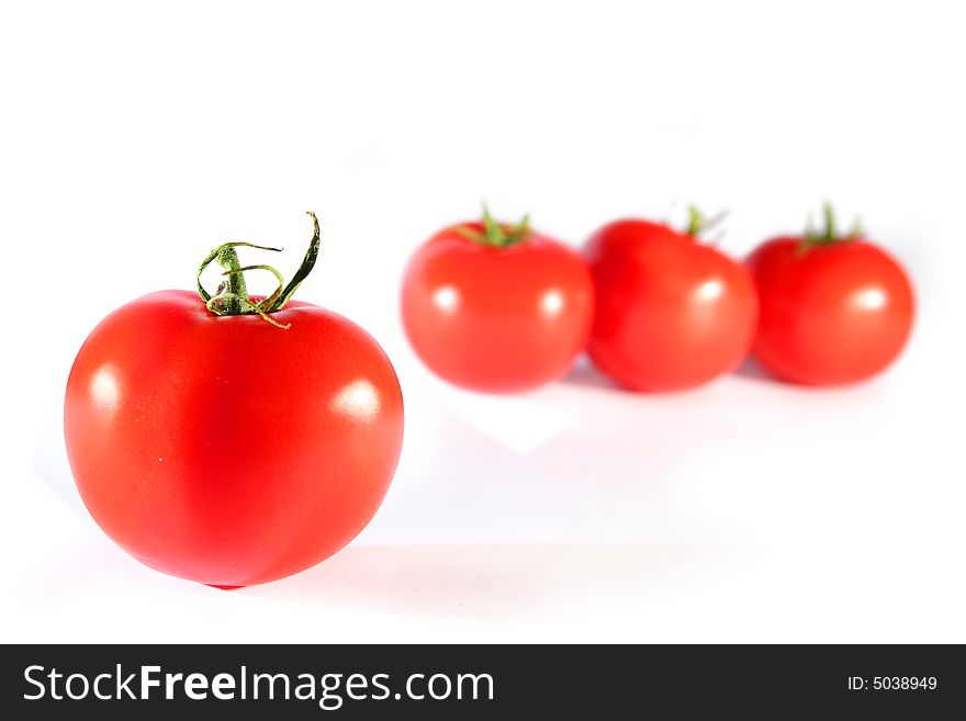 Fresh red tomatoes isolated on white background. Fresh red tomatoes isolated on white background