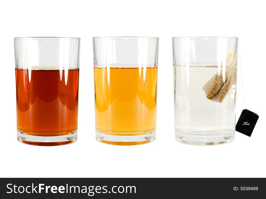 Three glasses and a tea bag, with clipping path
