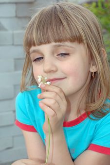 Girl With White Lilies Royalty Free Stock Images