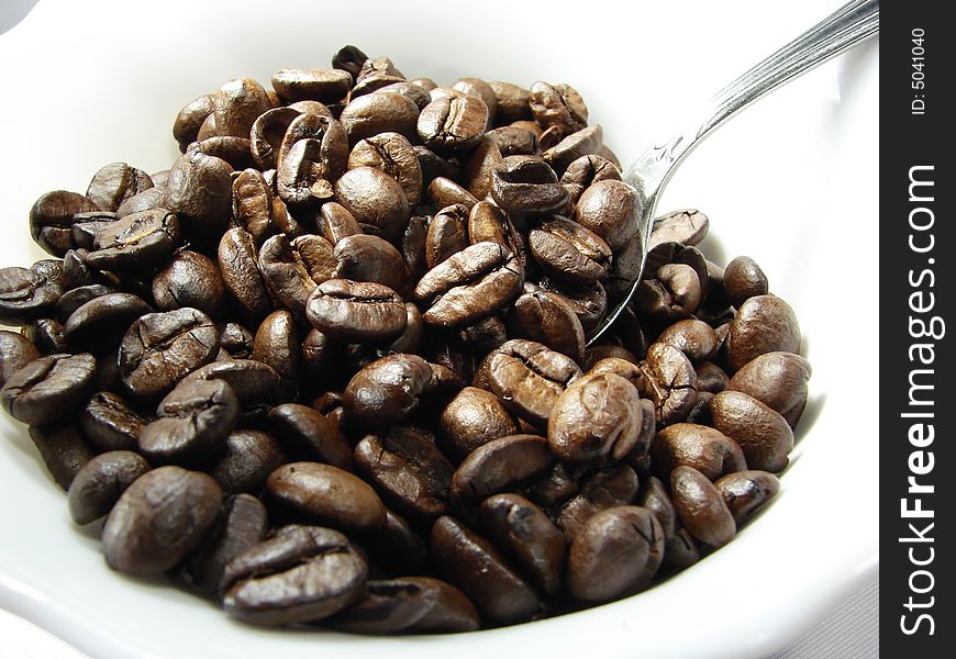 Natural coffee beans and spoon 4