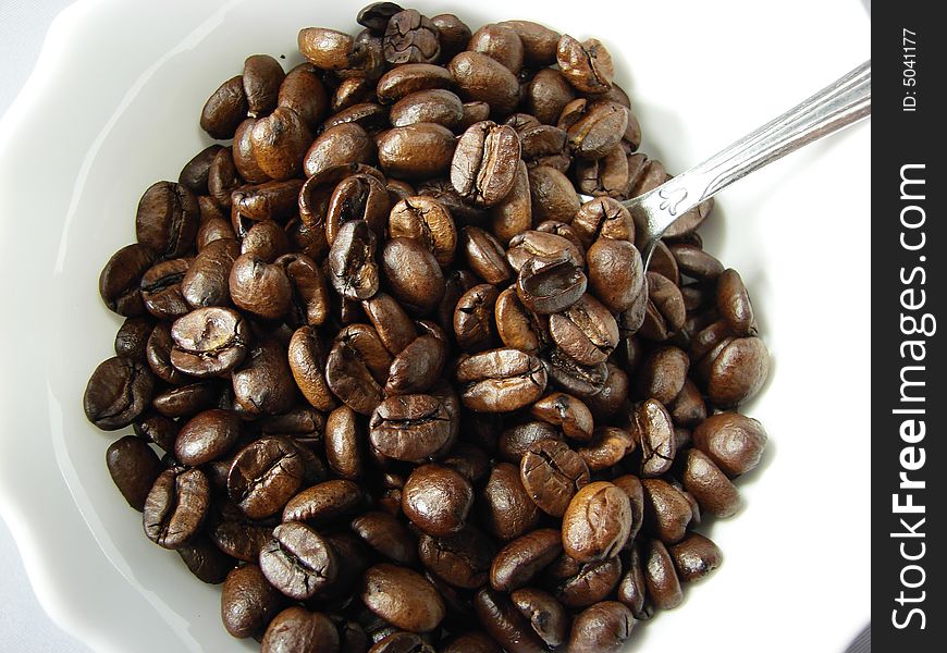 Natural coffee beans and spoon 3