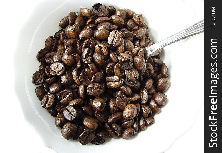 Natural coffee beans and spoon 2