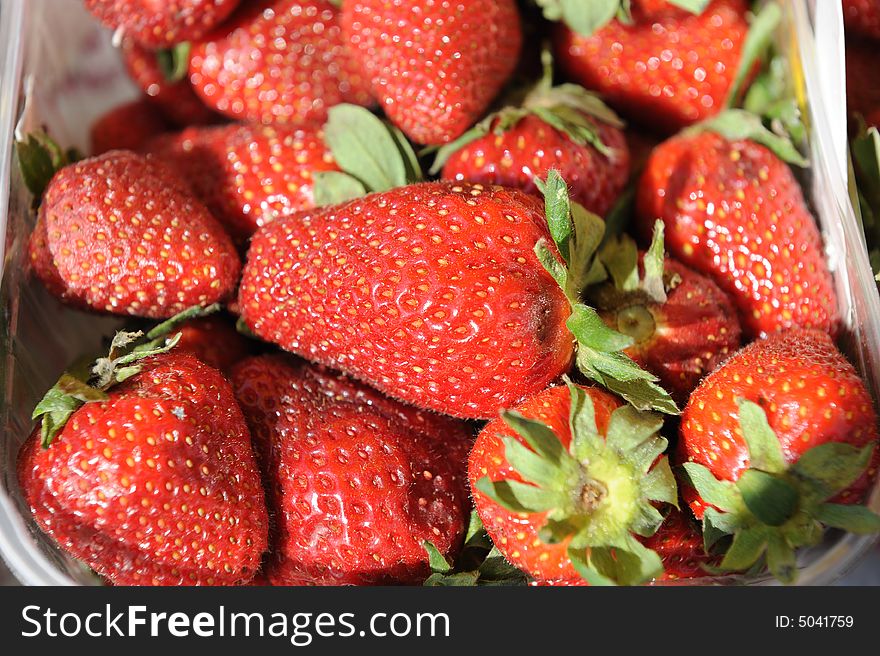 Closeup.Fresh fruit Strawberry on market. Closeup.Fresh fruit Strawberry on market