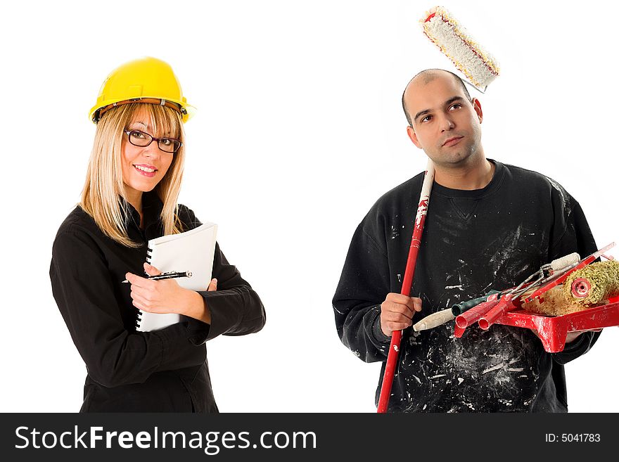 Businesswoman and house painter with paint roller