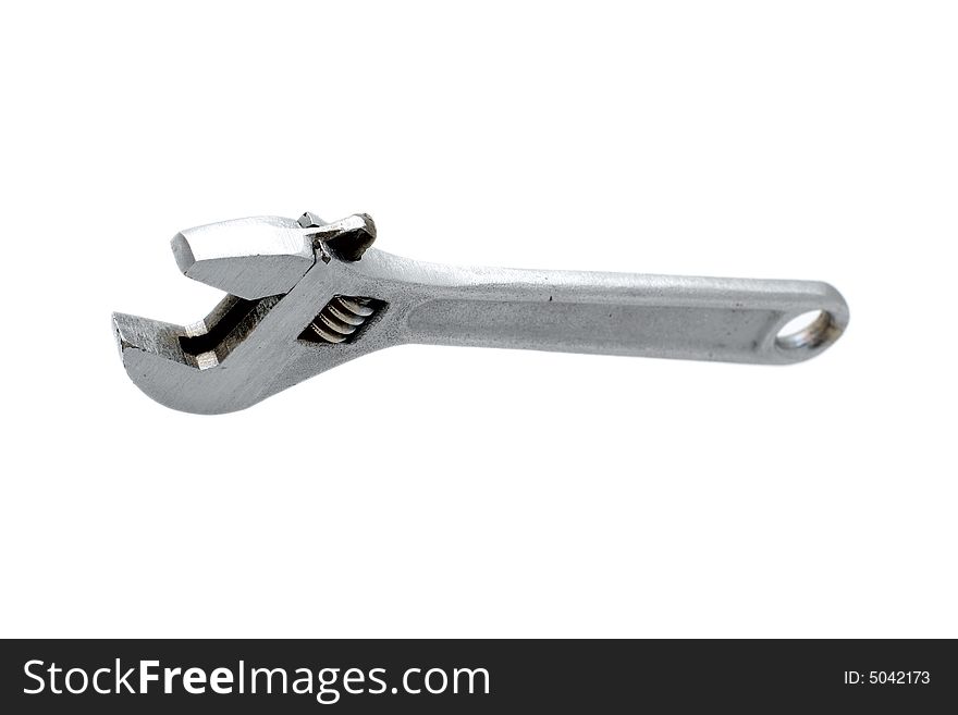 Metal wrench on white background