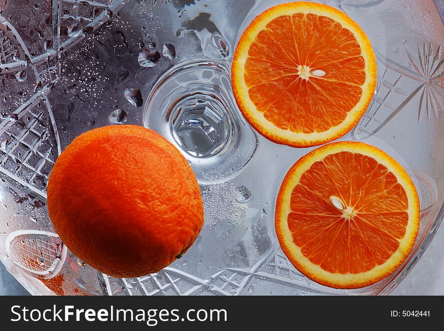 A cut three orange on gray computer-morphed background