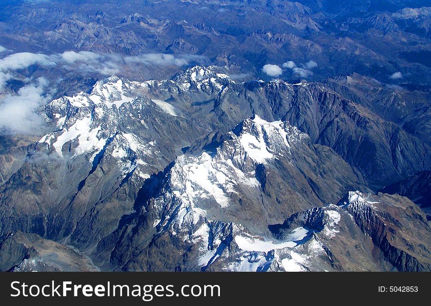 Aerial view of French Alps taken in the Summer. Aerial view of French Alps taken in the Summer