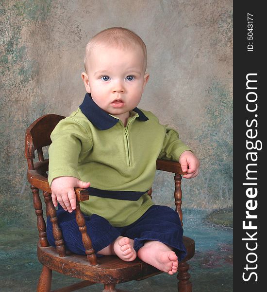 Baby on Wooden Chair