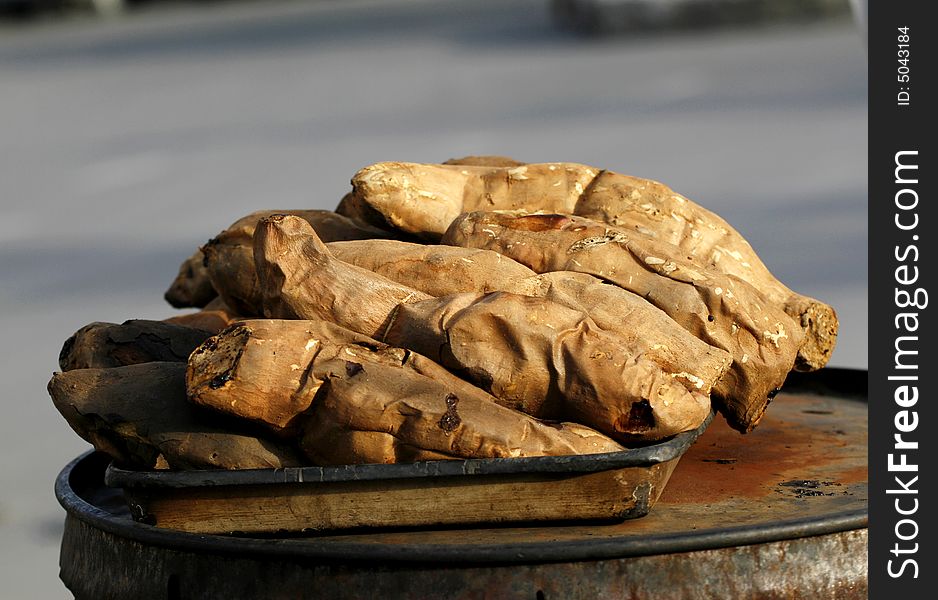 The roast sweet potato in the street of Beijing is very famous snack in the locality. People often can smell its perfume in the distant place. The roast sweet potato in the street of Beijing is very famous snack in the locality. People often can smell its perfume in the distant place.