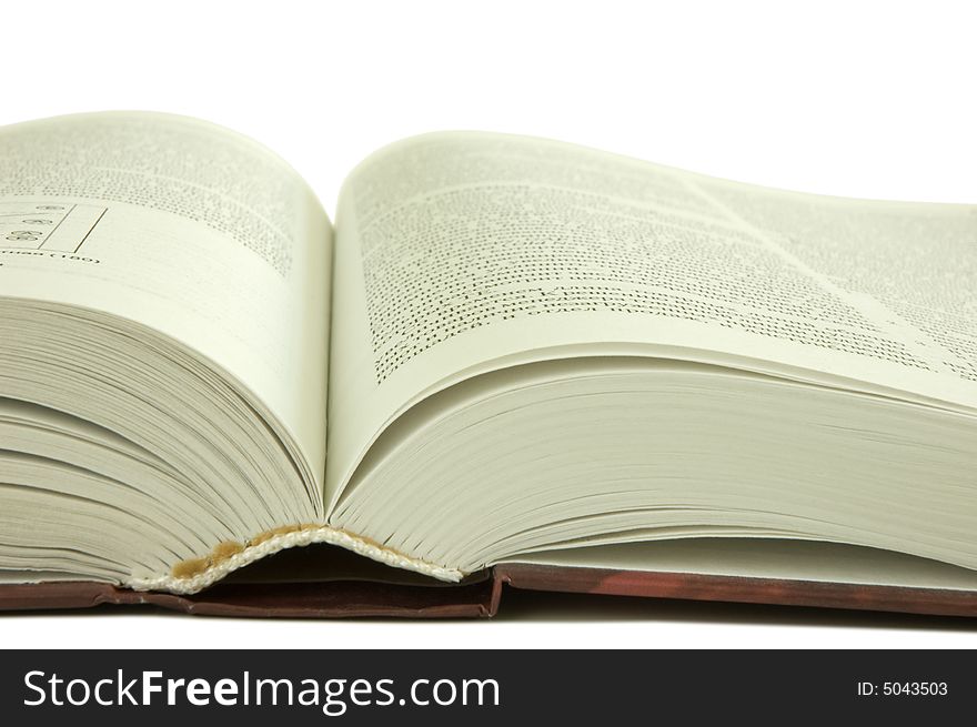 Isolated large open book on a white background, selective focus