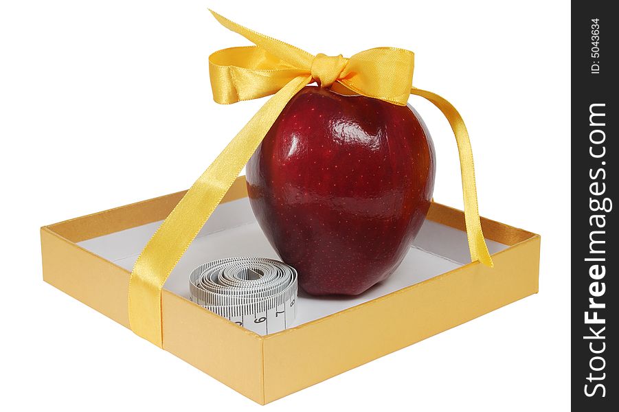 Red apple in box with tape-line like gift. isolated on white