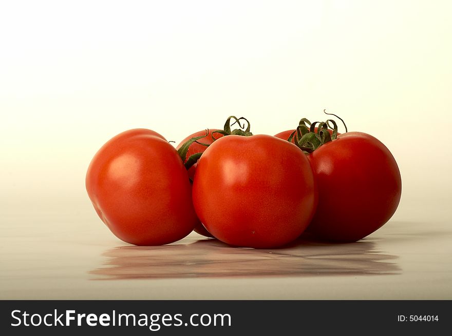 Group of tomatoes in white background