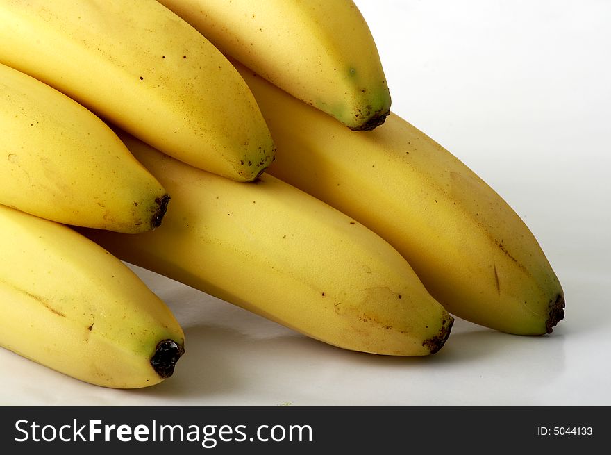Six bananas in white background