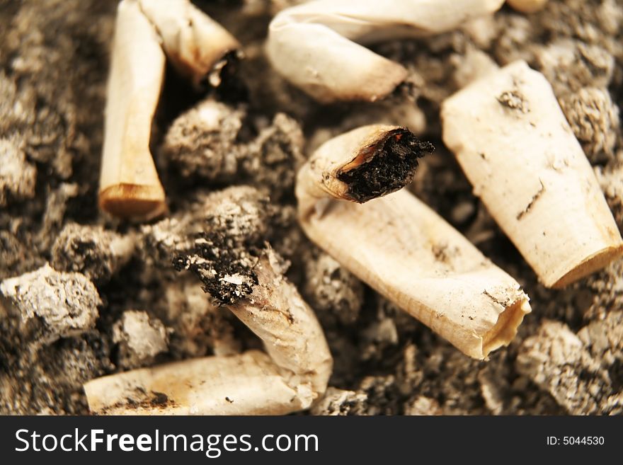 Close up of cigarettes in an ashtray (low DOF)