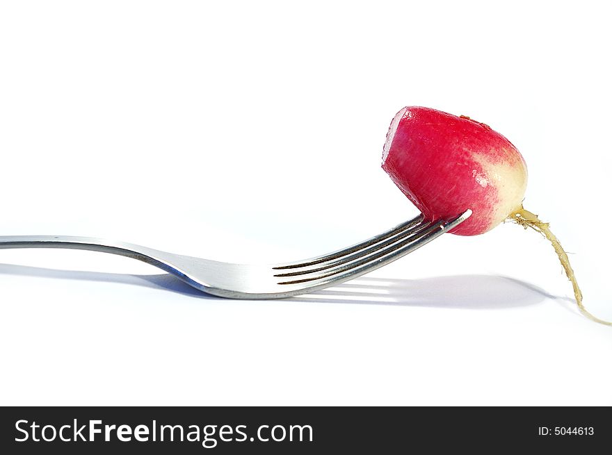 Fork and radish isolated on white background