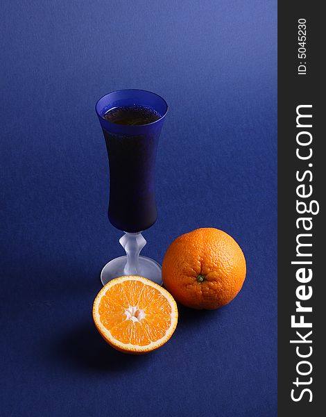 Oranges and glass with juice. Oranges and glass with juice
