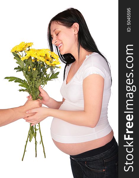 Presenting flowers to pregnant girl on a white