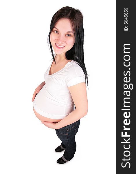 Pregnant girl top view on a white