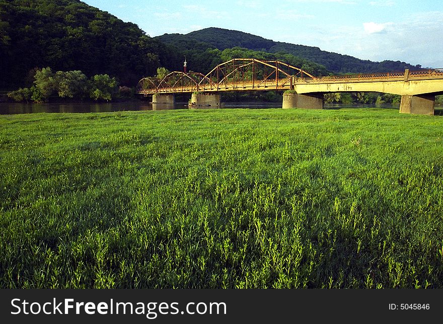 Old metal bridge over Mures River, Romania