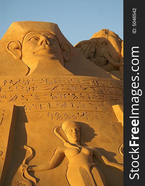 Sand sculpture of an Egyptian pyramid with hieroglyphs. Sand sculpture of an Egyptian pyramid with hieroglyphs