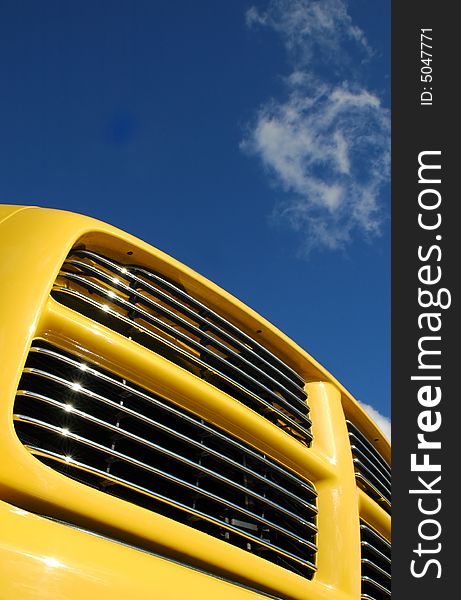 Colorful truck grill close-up against blue sky. Colorful truck grill close-up against blue sky