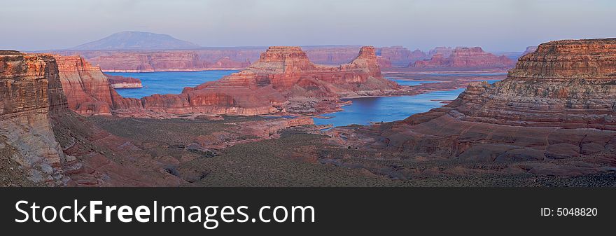 Sunset lit buttes in Lake Powell.