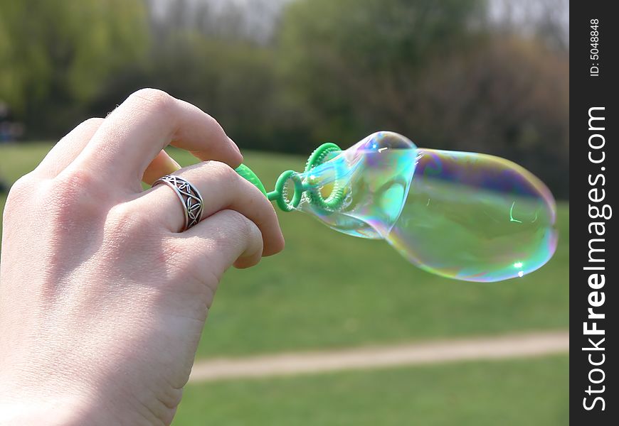 Playing with the soap bubble