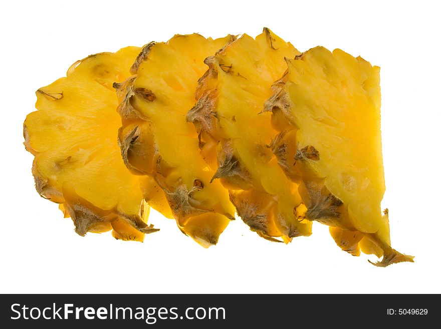 Four half pineapple slices isolated on white background