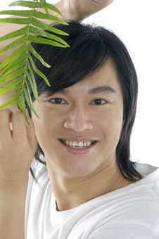 Man On Holding A Small Plant Stock Image