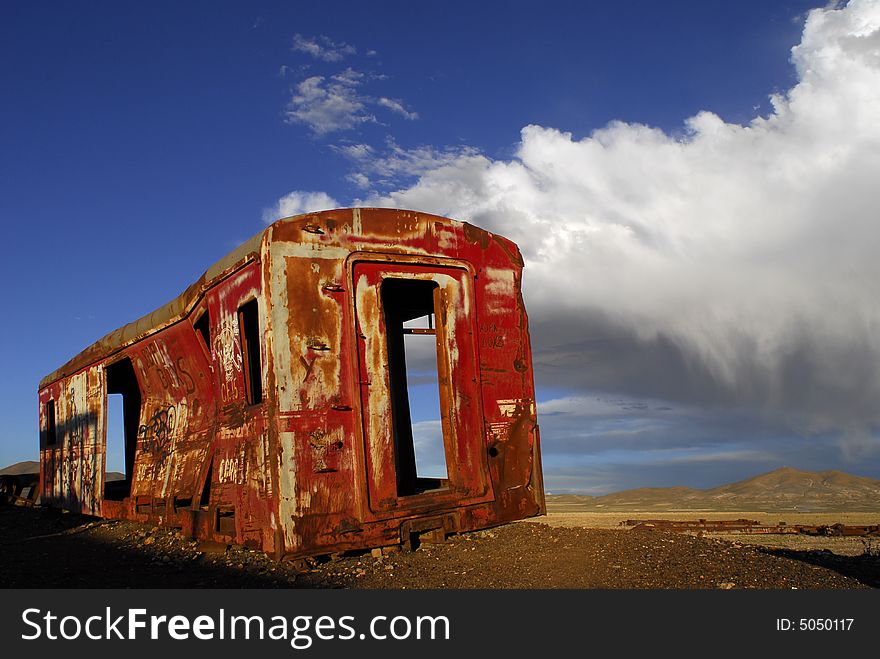 Abandoned train carriage in bolivian desert