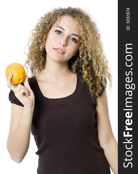 A beautiful young women holding an orange