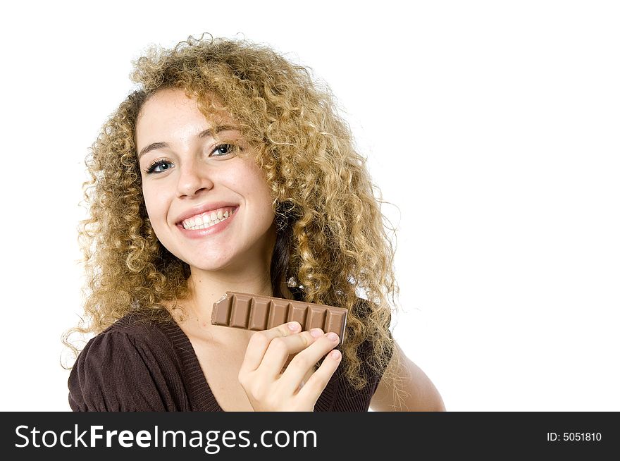 A beautiful young women holding a bar of chocolate. A beautiful young women holding a bar of chocolate