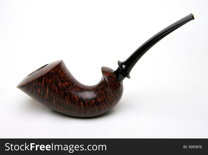 An tobacco pipe on white background.