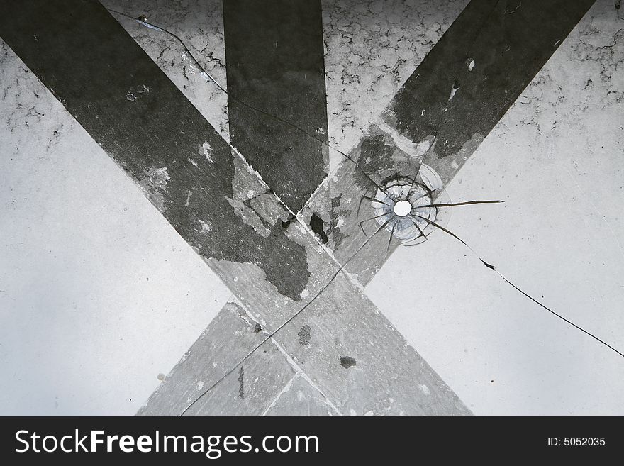 A broken window in an old school