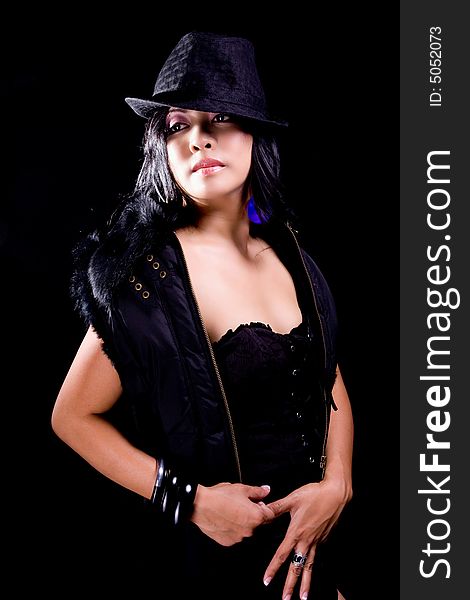 Model in a black dress and a Black Hat. Model in a black dress and a Black Hat