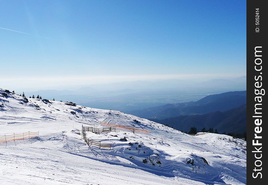 View from snow mountain to valley. View from snow mountain to valley