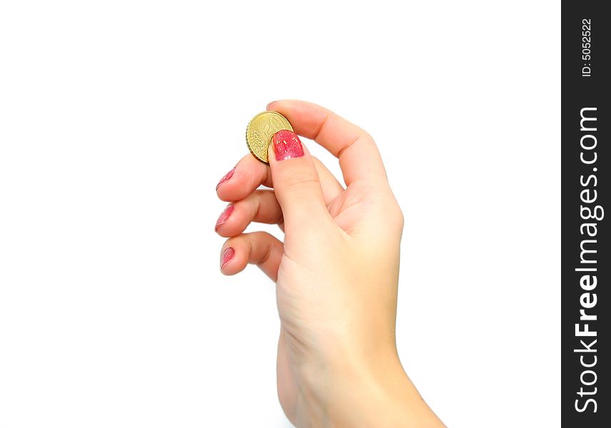 Female hands holding coin  isolated on white. Female hands holding coin  isolated on white