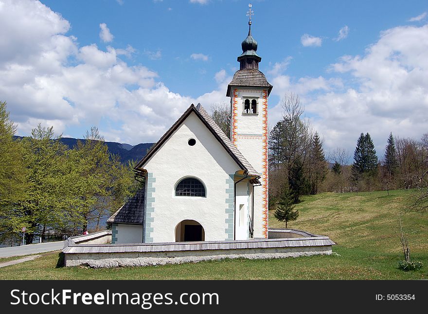 View on a small church in countryside in Slovenia