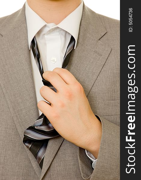 Stressful businessman untying his necktie